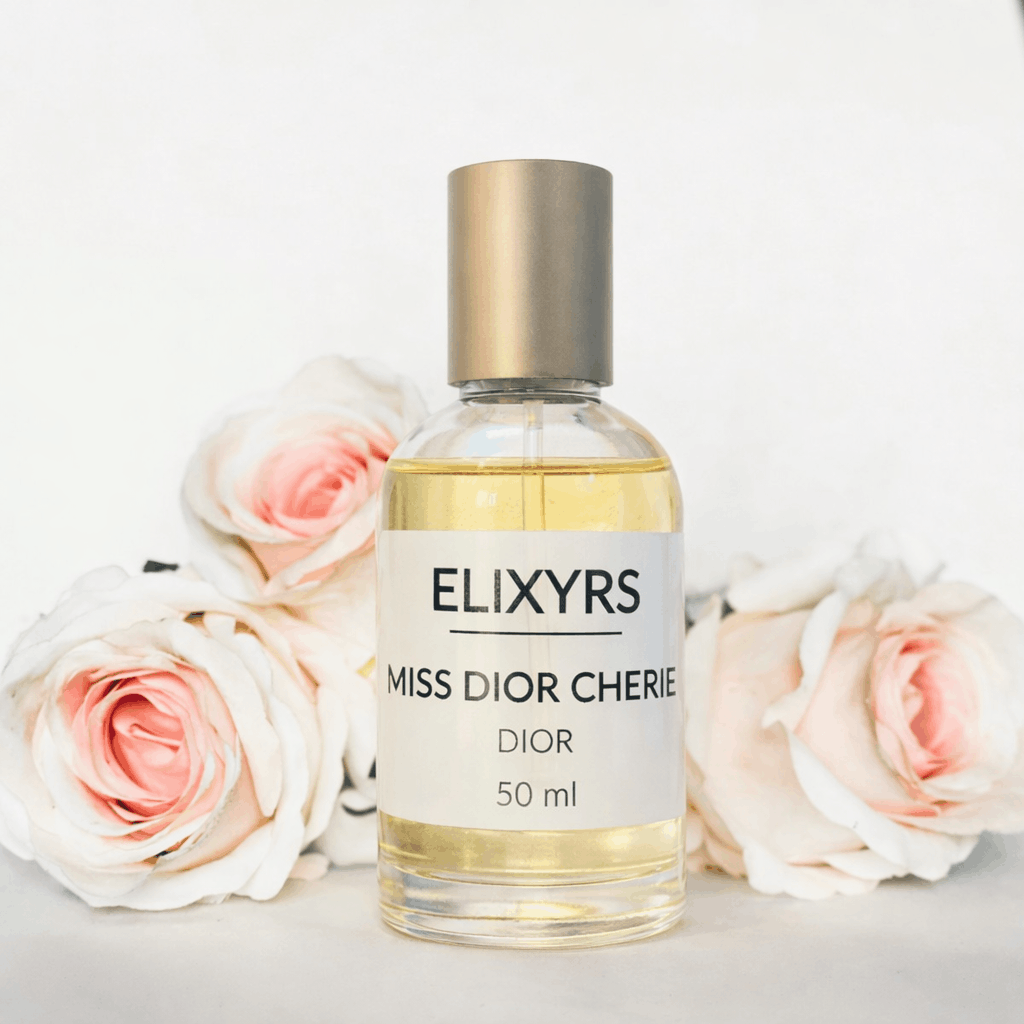 Flacons de parfum ELIXYRS mis en scène en boutique